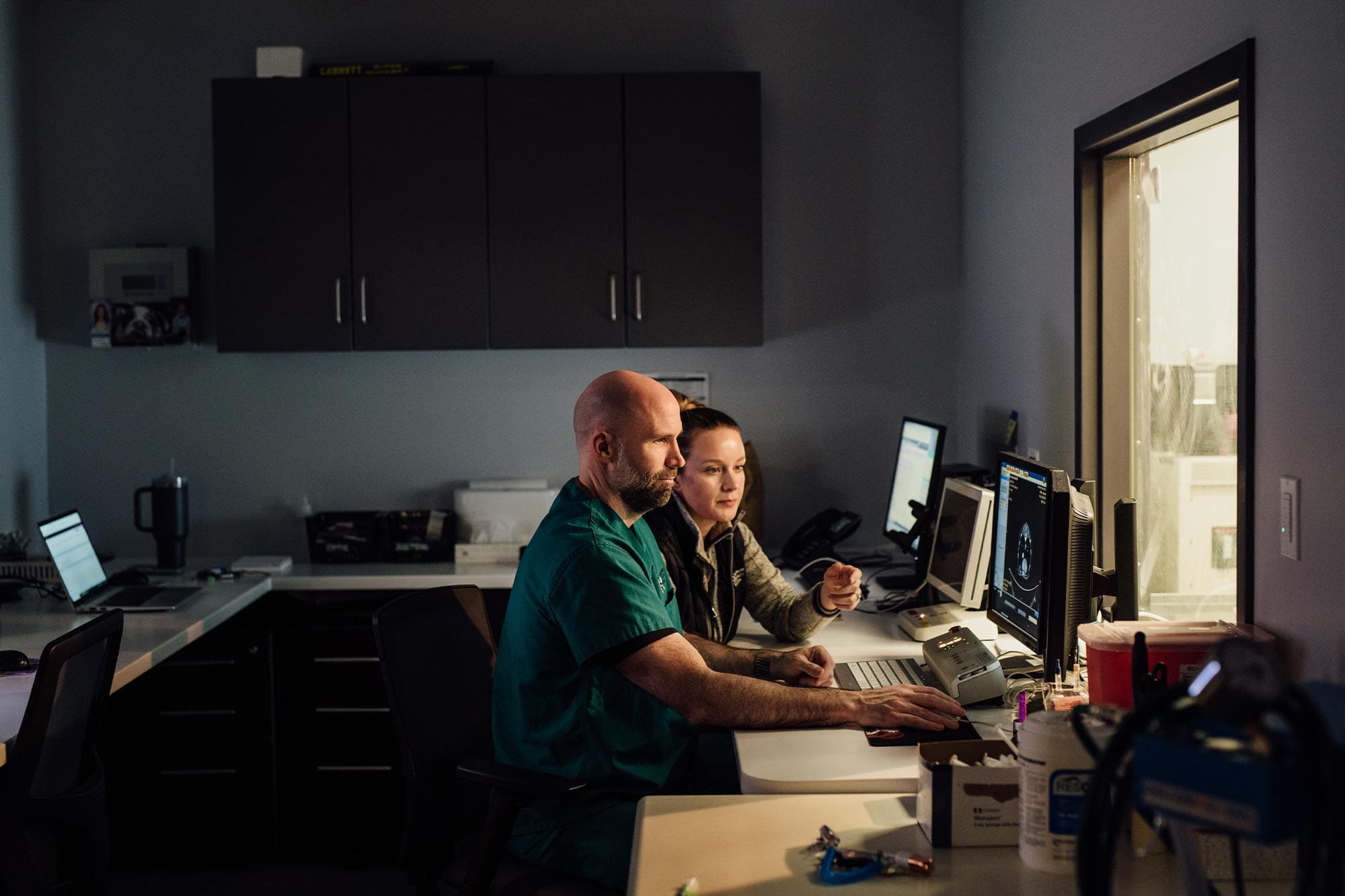 doctors looking at ct scan results