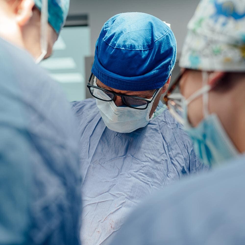 Close Up Of Veterinarian Performing Surgery